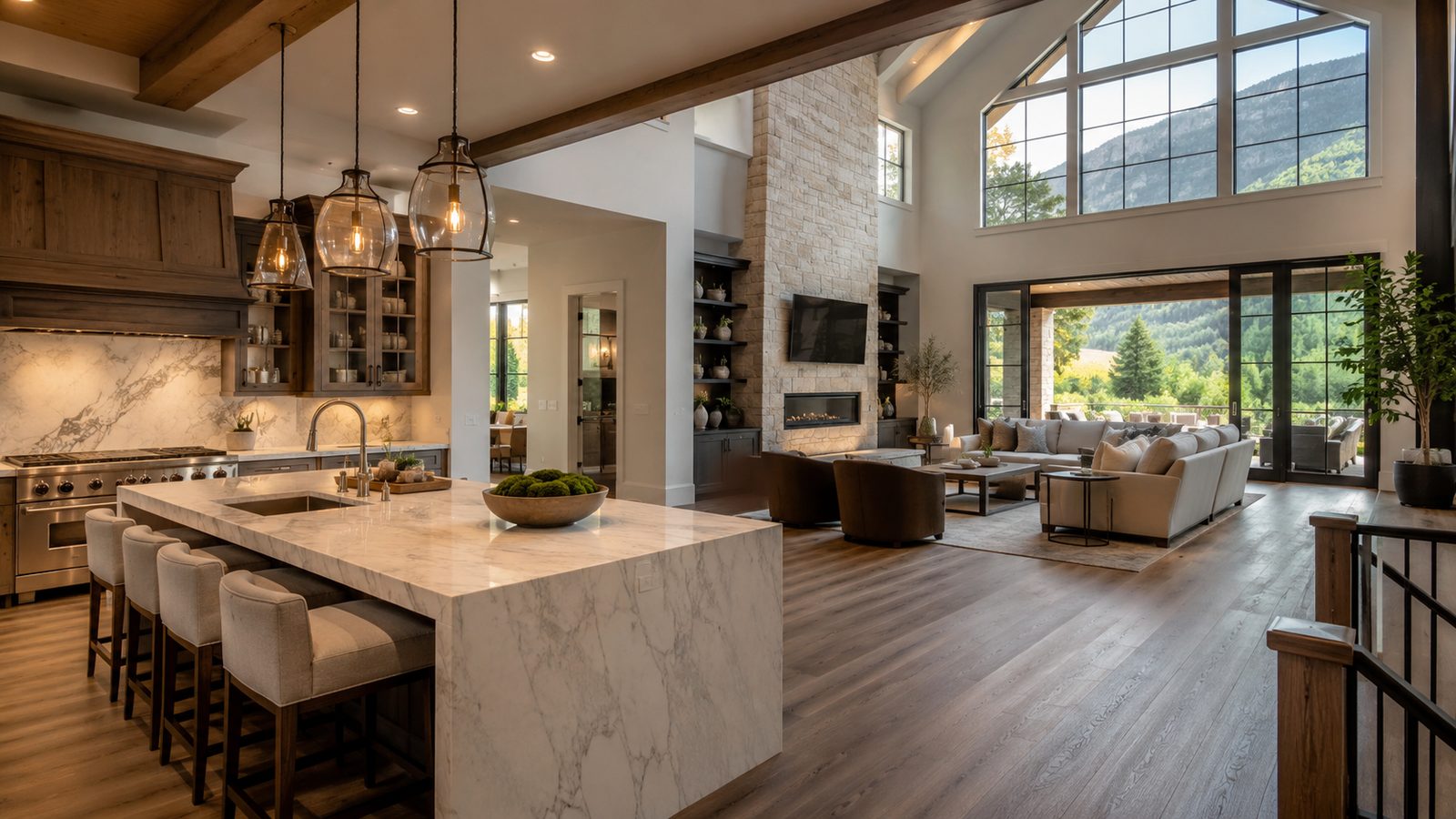 Custom home interior with open-plan kitchen, marble waterfall island, and vaulted great room